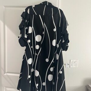 Really good condition almost new beautiful black dress with beautiful sleeves